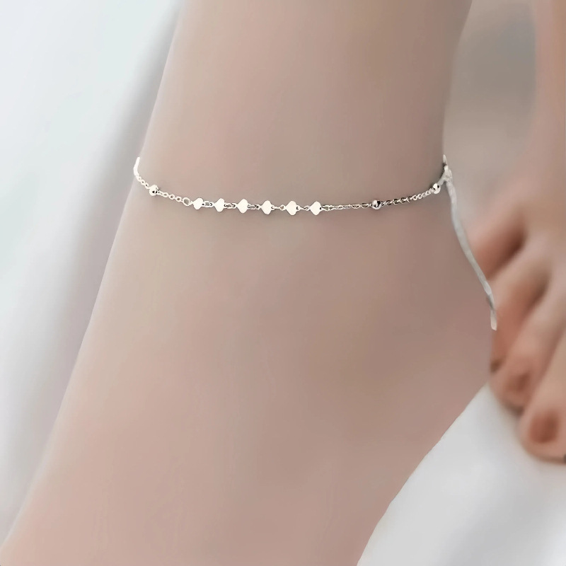 S925 plata de ley chapada en oro 16K lentejuelas de amor, tobillera, cuentas de mujer, viento frío, diseño de nicho, temperamento, accesorios para pies de todo fósforo