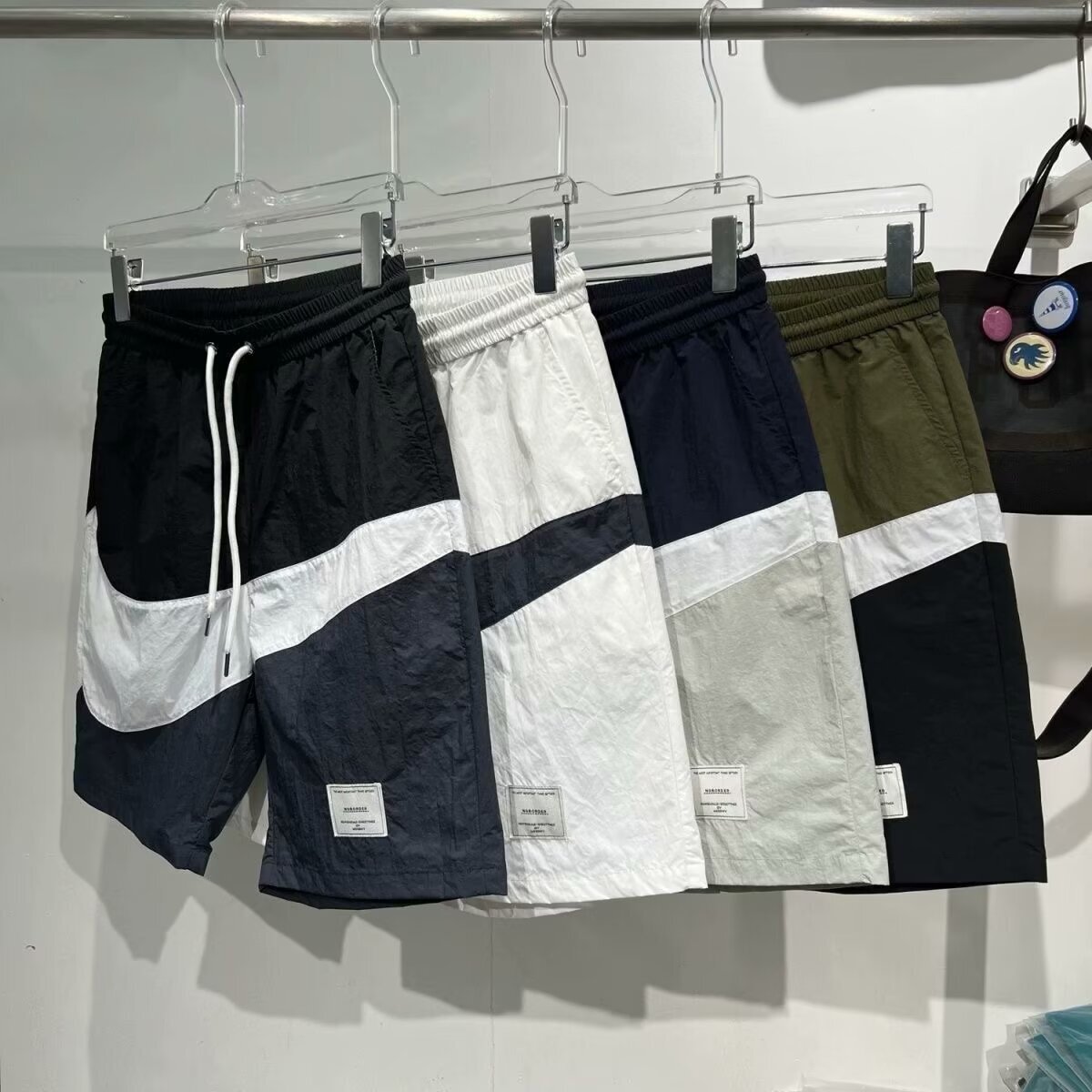 Verano de 2025 nuevos pantalones cortos de trabajo estadounidenses varones de verano de moda japonesa sueltos recto ocio rápido secado cinco puntos
