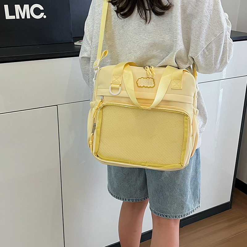 新款日系手提托特痛包女大容量学生党双肩斜挎两用包可爱书包