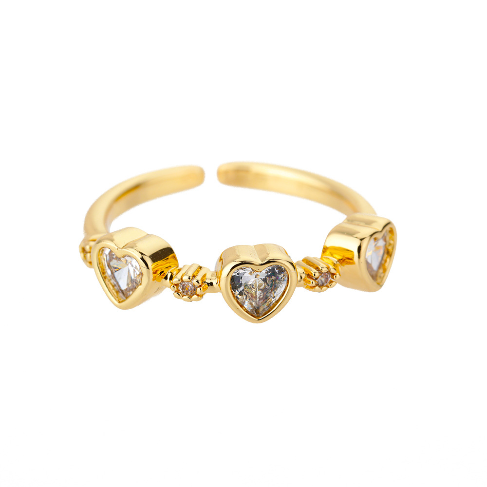 Anillo ajustable chapado en oro de 18K con corazones y circonia