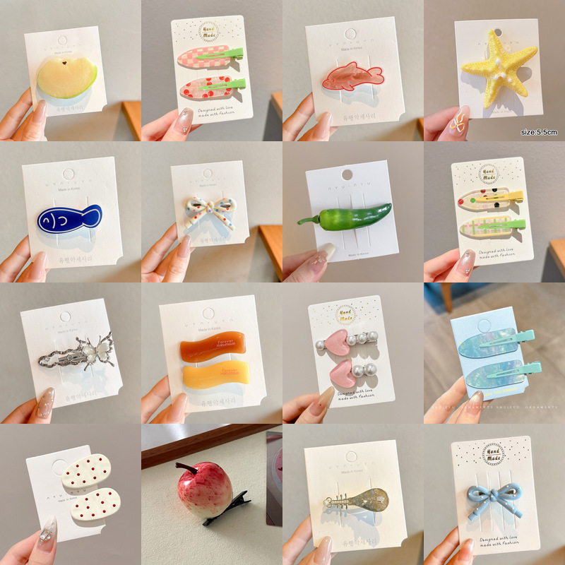 Coreano simple ondulado punto de amor estricto clip de cabello dulce chica arco lateral clip de boca de pato nueva tarjeta de cabello rojo en línea