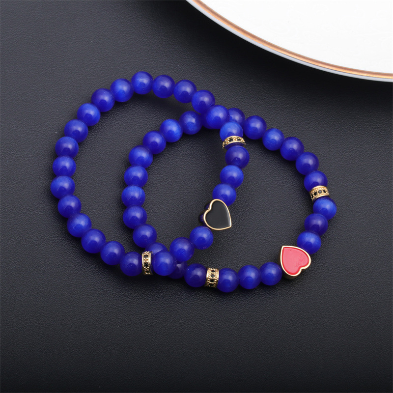 Las mujeres europeas y americanas transfronterizas Opal pulsera de amor con cuentas de cobre micro-incrustaciones de aceite de gota en forma de corazón pulsera de pareja de mujeres