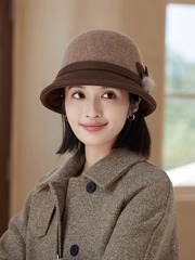 ウールは漁師帽の女性です。