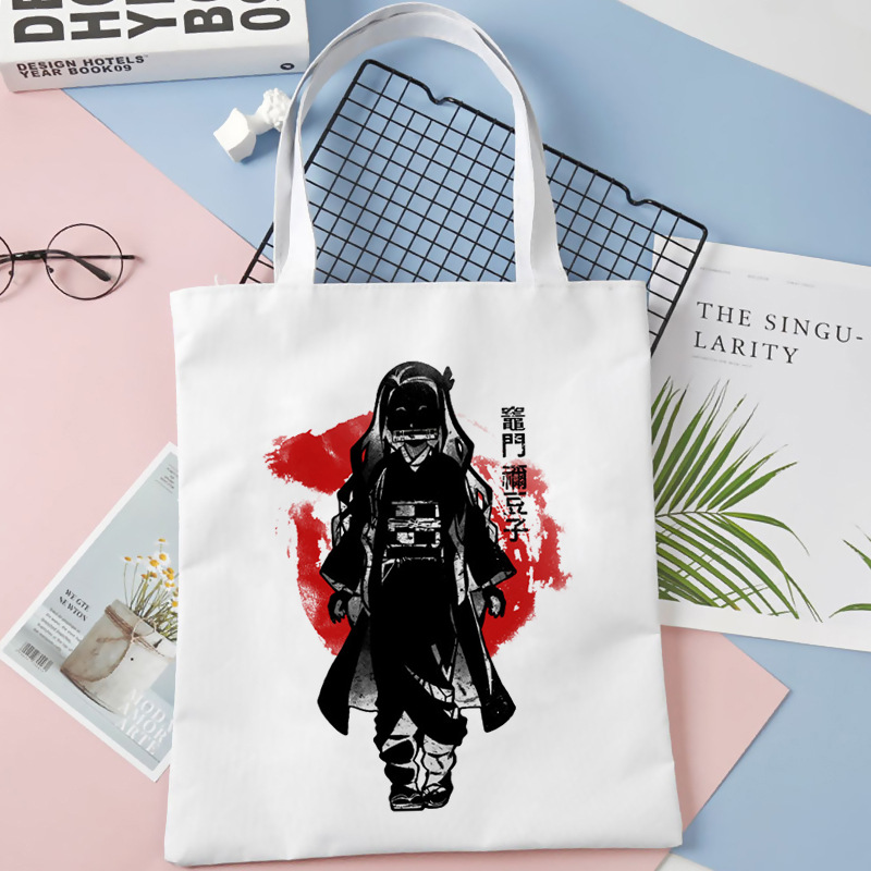 Comercio exterior transfronterizo Demon Slayer impresa bolsa de lona Harjuku bolsa de hombro bolsa de compras portátil de moda para estudiantes