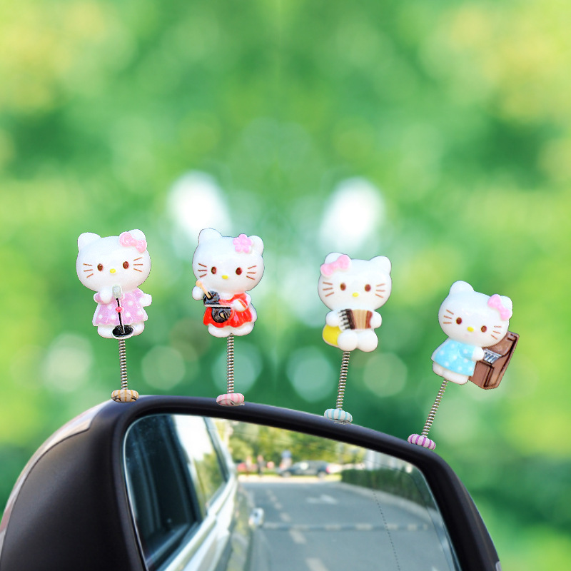 Nuevos productos adorables adornos de automóviles muñecas creativas decoraciones interiores de automóviles primavera sacudiendo la cabeza cabeza cabeza cabeza sala de transmisión directa con mercancías