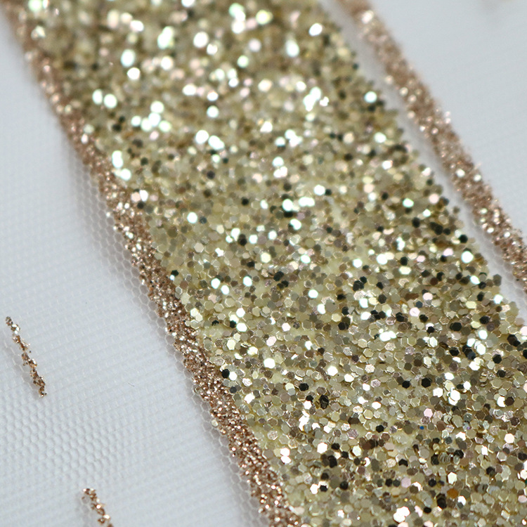Fabricantes promocionales de bajo precio rociado oro rociado oro alto brillo vestido de boda tela de encaje accesorios