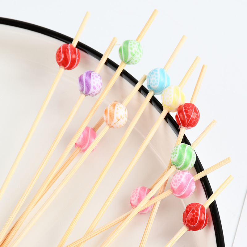 Suministro spot cuentas de color desechables horquilla de fruta de dibujos animados bocadillos de fruta palillos de dientes de arte string stick stick stick bambú