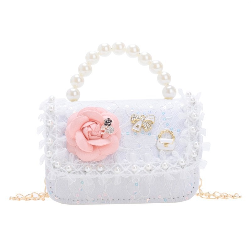 Nuevo bolso infantil, bolso de moda de perlas, bolso de hombro de flores de niñas, bolso de moda de cadena, mochila pequeña