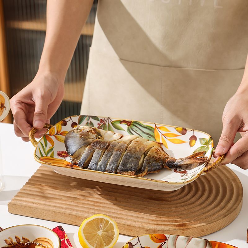 北欧のシンプルなかぼちゃの陶磁器の碗の皿のセットの家庭用陶磁器の食器の高い顔の値の軽い贅沢な日本式の双耳の碗のスプーン|undefined