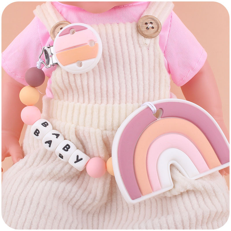 Productos infantiles de dibujos animados de silicona arco iris clip puede ser DIY nombre del bebé calmar la cadena de tetas anti-caída cadena nueva