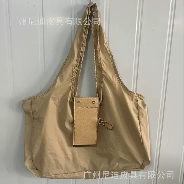 2026 Amazon New Women's Leather Key Bag Simple Pendant Storage Bag Multifunctional Convenient Fashion Handbag
