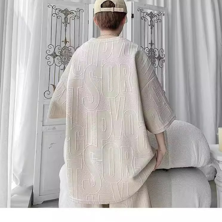 Camiseta de manga corta con gofres de letras para hombres, marca de moda de verano, traje de media manga de gran tamaño suelto