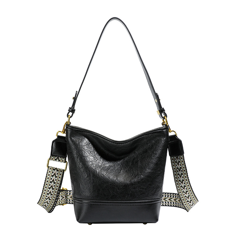 Cross-border 2025 invierno nuevo retro bolso de balde de mujer simple de gran capacidad bolso de hombro para viajar mochila