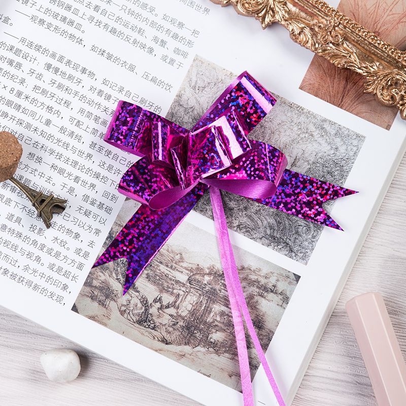 Venta caliente transfronteriza 18mm láser metálico dibujado a mano flor regalo de Navidad embalaje dibujo flor arco tirar flor envío gratuito