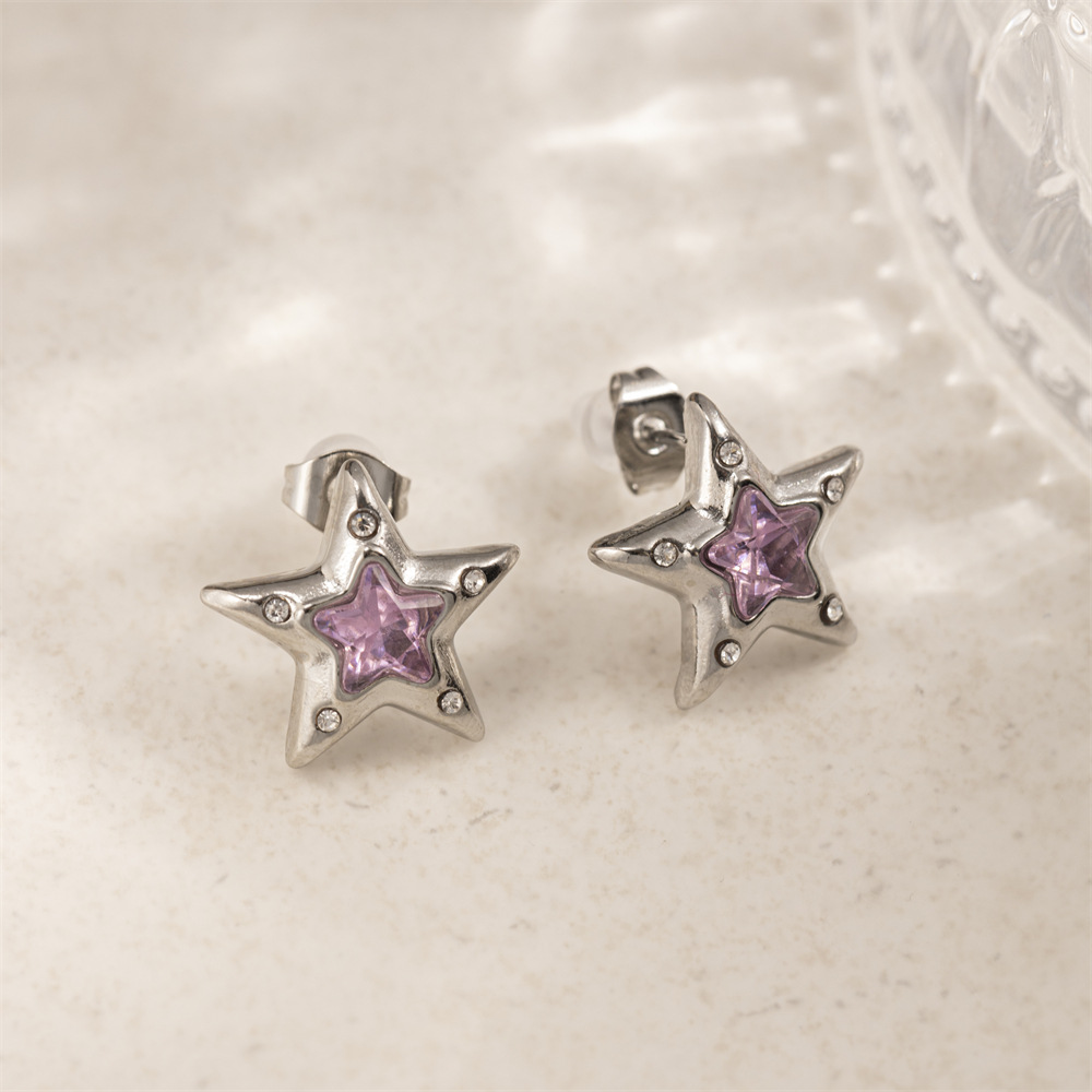 Taena Pendientes de acero inoxidable europeos y americanos Pendientes de estrellas de moda de nicho de lujo ligero y de alta gama Pendientes de acero de titanio para mujer transfronterizos