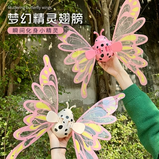 跨境新款恐龙精灵电动蝴蝶发光翅膀天使翅膀儿童户外玩具夜市批发
