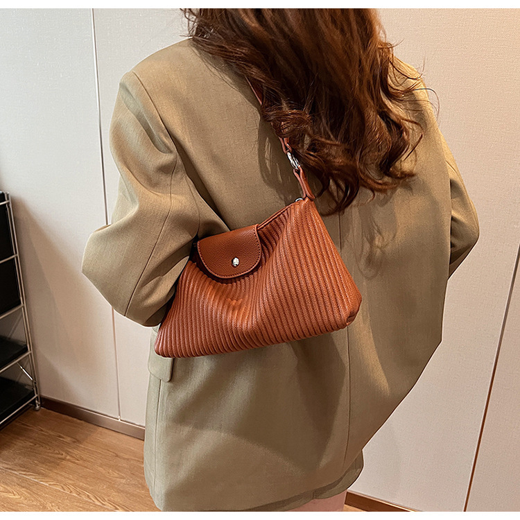 Niche design pleated striped 2024 new women's versatile and simple single shoulder pillow crossbody armpit bag_voghion.com