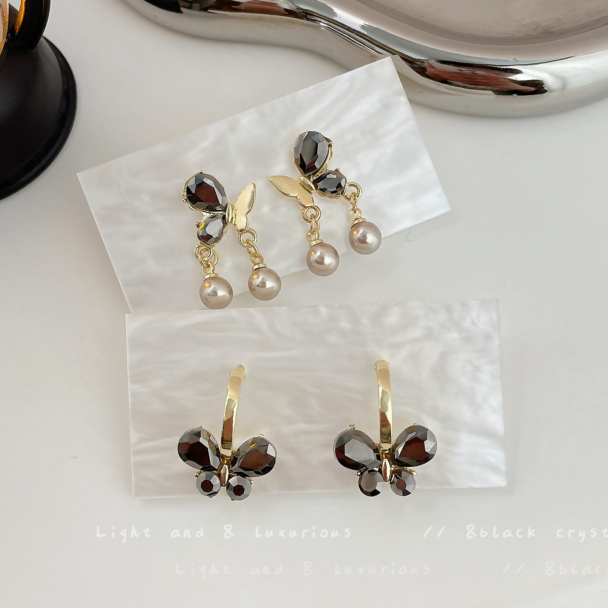 Brincos de borboleta e pérola exclusivos para mulher prata_voghion.com