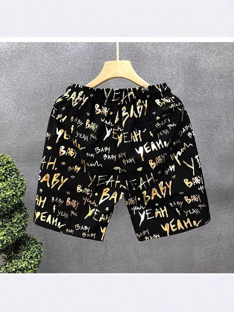 Pantalones cortos de impresión dorada populares para hombres de verano delgados pantalones de cinco puntos para hombres fuera de casa para usar pantalones de playa pantalones de pantalones de pantalones de gran tamaño