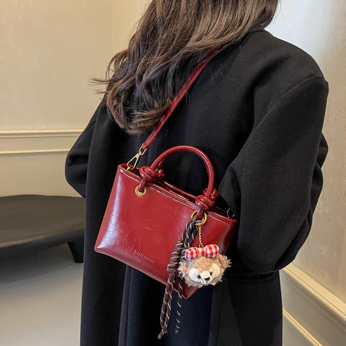 Otoño y invierno Meirad bolsos de mujer 2024 nueva moda moda bolsos de cubo de mano alta sensación de mochila versátil