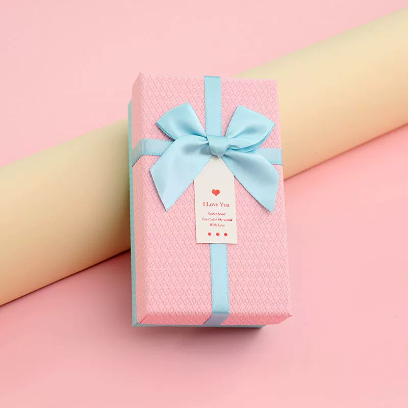 Rectangular lipstick with bow, cosmetic perfume, gift box