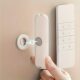 Remote control magnetic buckle strong paste suction cup magnetic row plug holder non-punch row router magnet buckle
