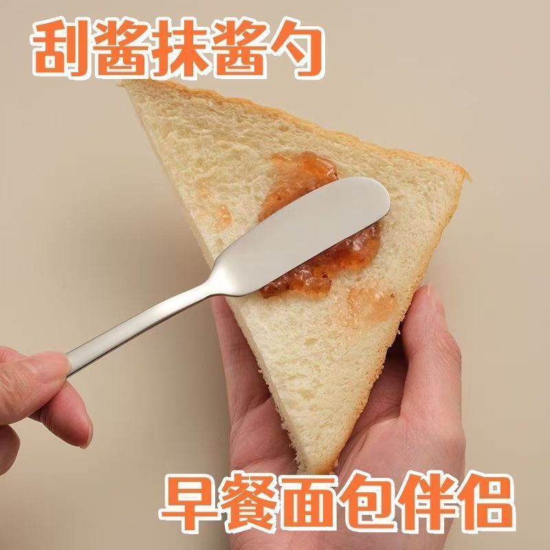 New long-handled stainless steel spreader spoon with a flat head for spreading jam, cream, and sauce on bread and pancakes