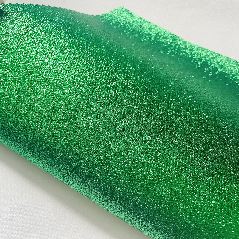 Suministro directo de fábrica de tela no tejida Glite Brillante Tela de lentejuelas Estuche para teléfono móvil Bolsa de cosméticos Accesorios para el cabello Decoración de ropa