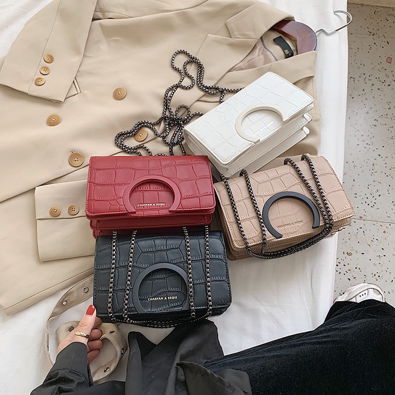 Capacious black phone bag for leisure