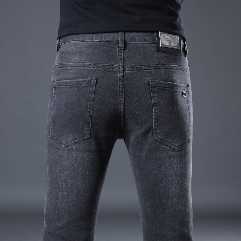 El fabricante de origen una pieza de jeans de todo fósforo negros y grises, pantalones de pie delgados de la marca de moda elástica para hombres