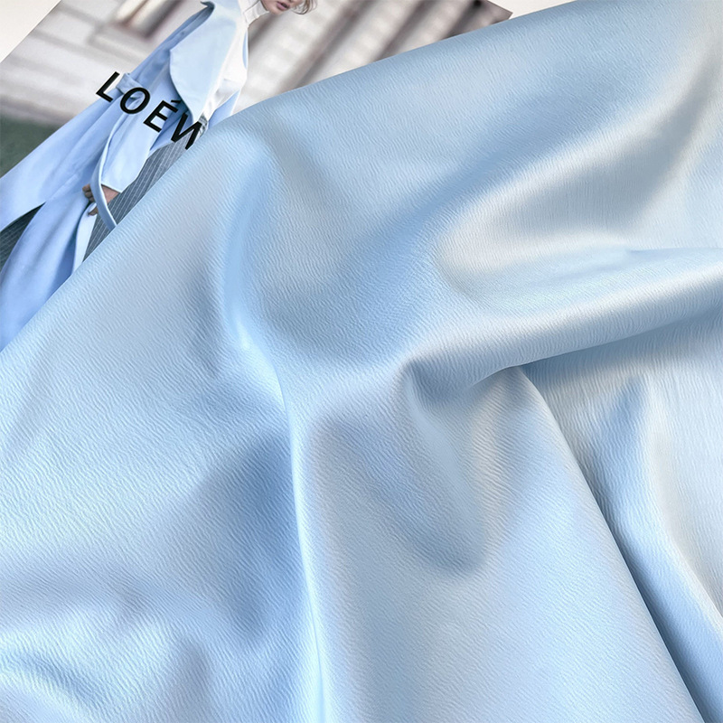 光泽不透浅蓝色水波纹肌理时装面料 礼服连衣裙套装布料优雅