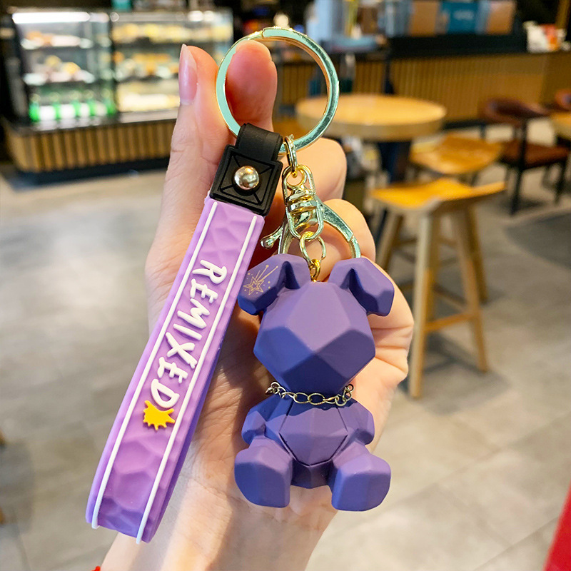 Portachiavi per auto con zaino e macchina a forma di coniglio in resina, con artiglio, ciondolo di celebrità di Internet_voghion.com