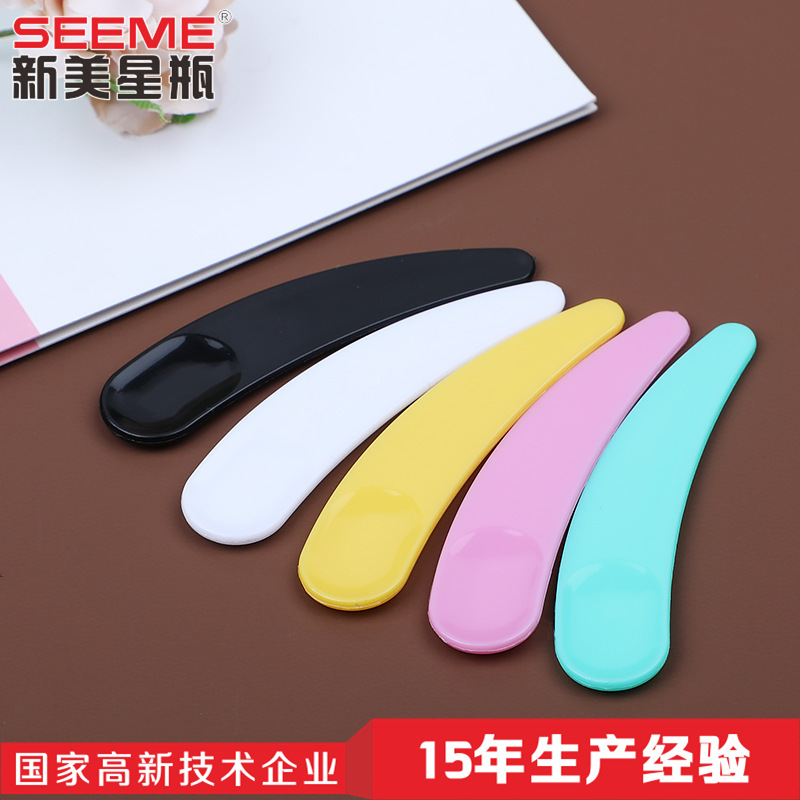 Plastic cosmetic spoon