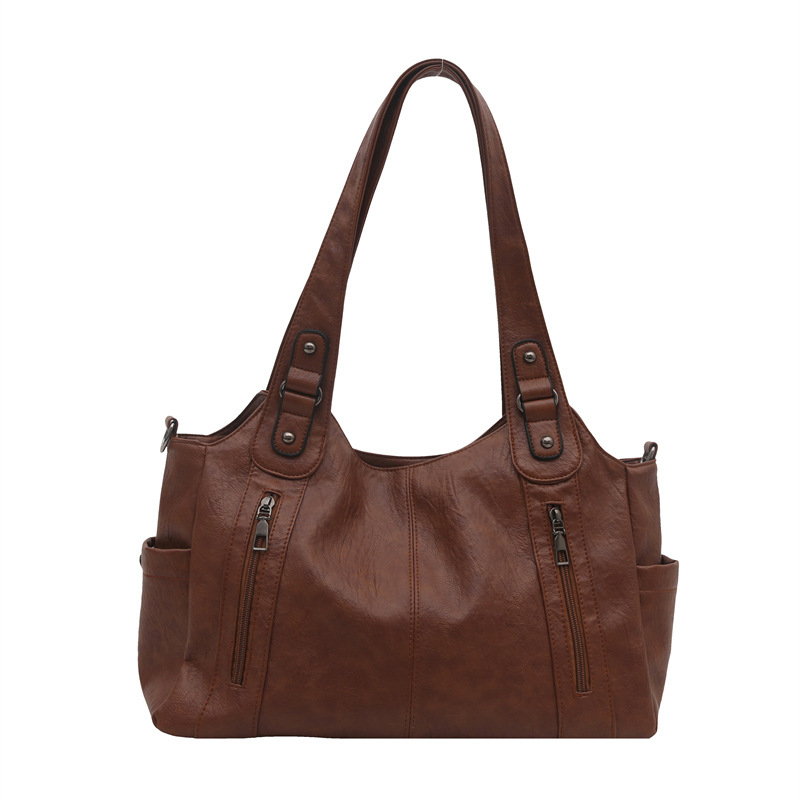 Bolso retro de gran capacidad 2025, nueva textura de moda para viajar bolso de mujer, viaje corto, mochila