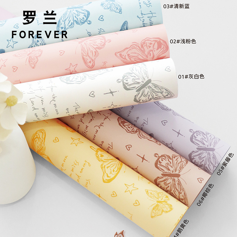 Roland Retro Papel de embalaje de flores mariposa plástico OPP impermeable ramo de flores a mano florista material floral al por mayor