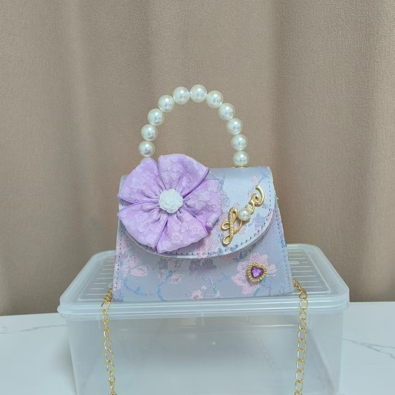 Bolsa infantil nueva niñas bolso de hombro accesorios de ropa china bolso cuadrado princesa bolso de perlas bolso arco bolso de mochila