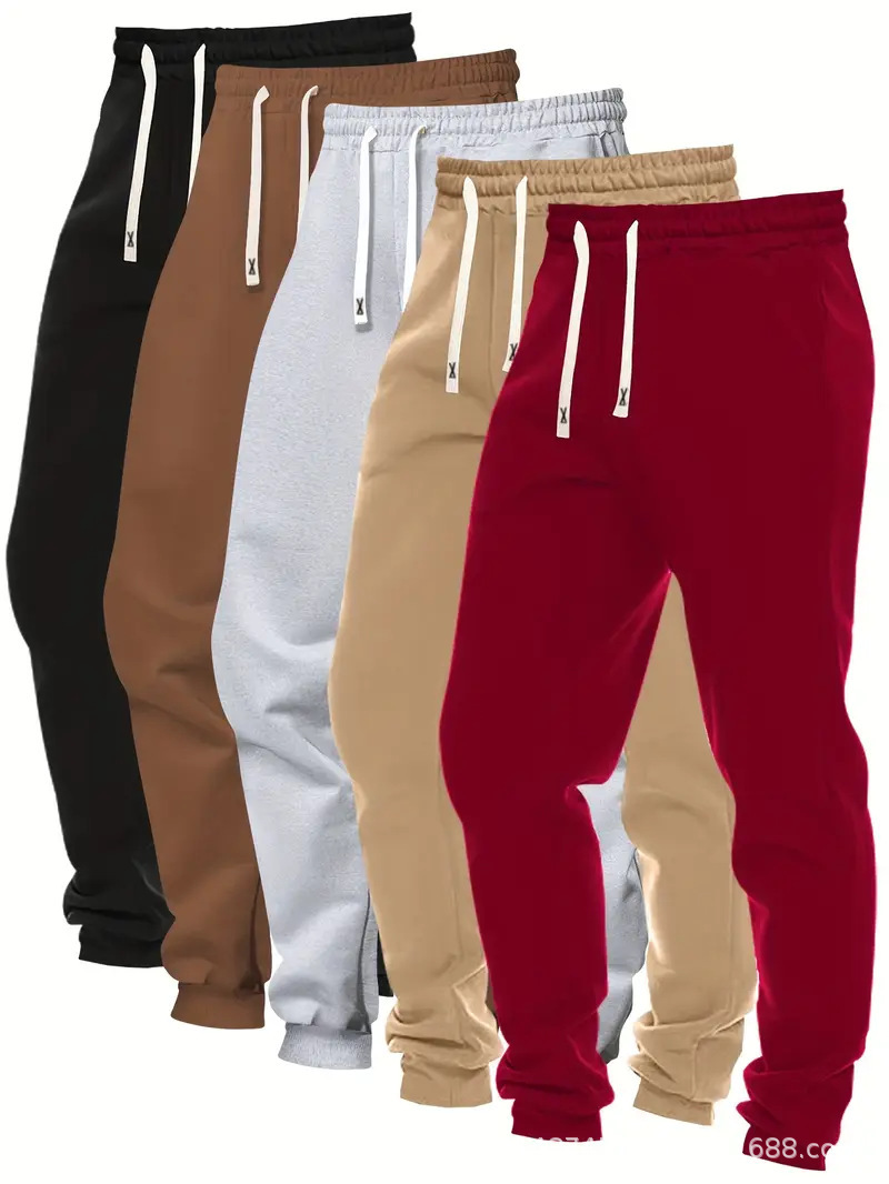 2026 explosión transfronteriza pantalones deportivos de moda masculinos de cinco piezas de color sólido cómodos ociosos pantalones de alimentación directa plataforma