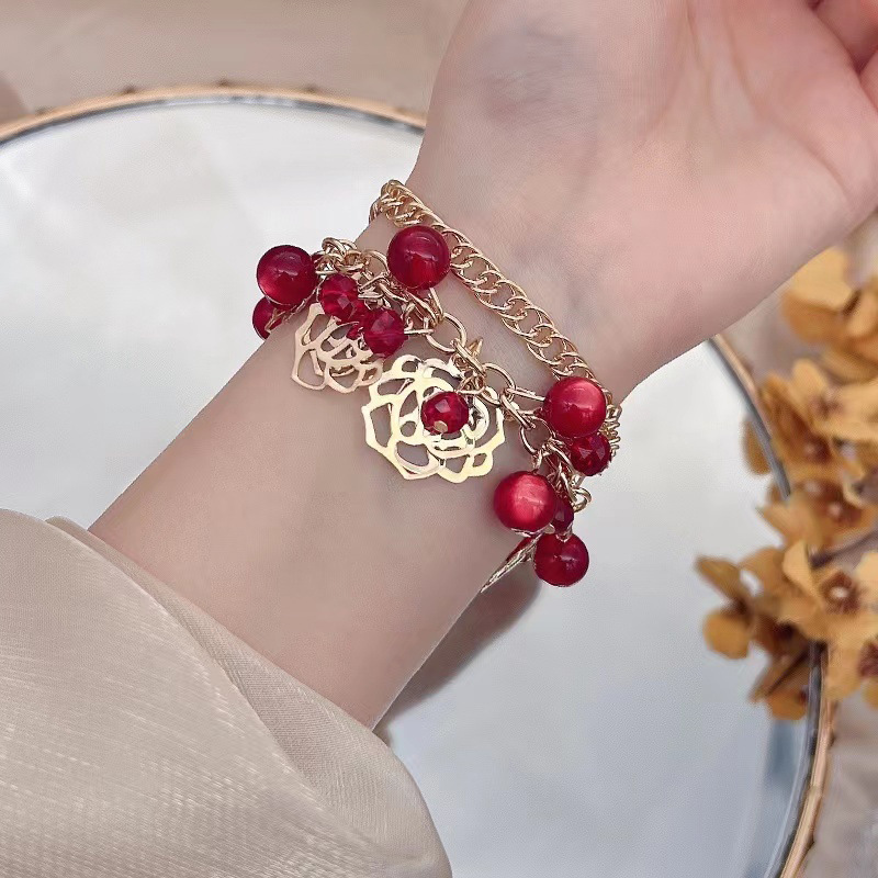 Casual Hip-Hop Flower Alloy Plastic Artificial Gemstones Women's Bracelets display picture 1