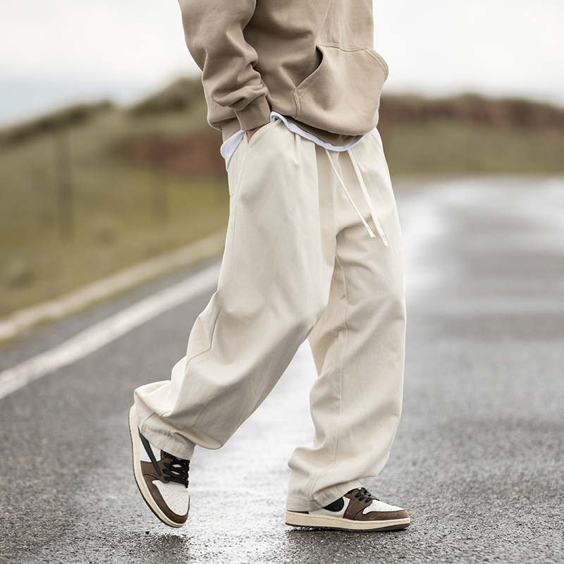 Pantalones casuales verticales rectos lavados con arena de algodón puro para hombres 2025 primavera nuevo diseño plisado herramientas pantalones básicos de todo fósforo