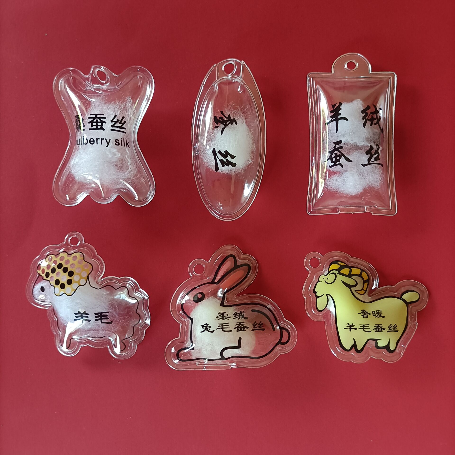 厂家供应 PVC桑蚕丝吊牌 羊毛羊绒充气标 服装辅料 充绒包