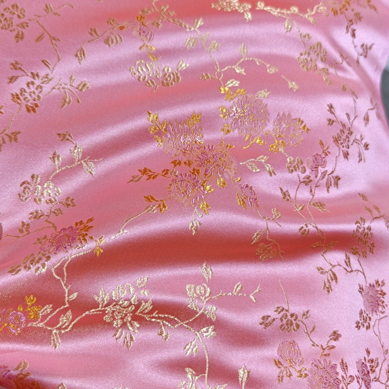 暗纹布料丝绸织锦锻粉色唐装旗袍民族服装风