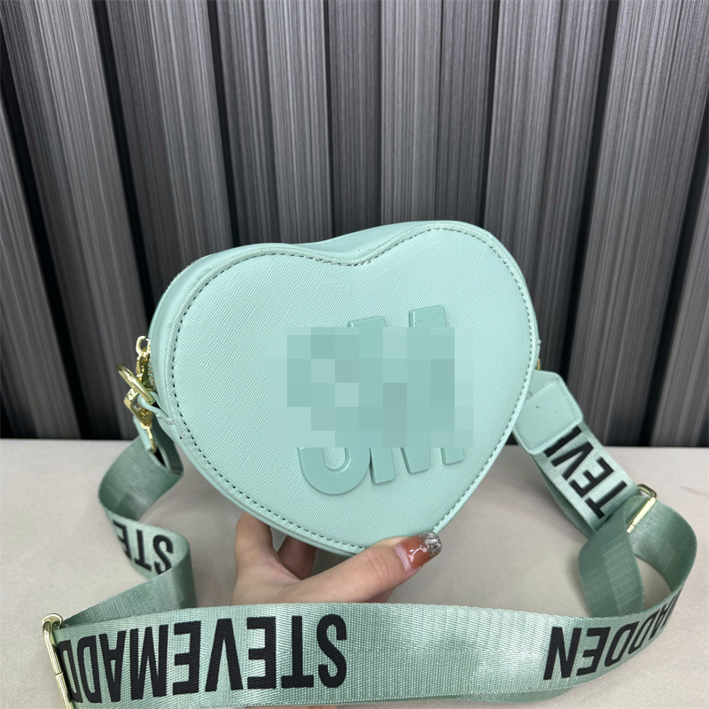 Bolso de hombro transfronterizo para mujer, sentido de alta gama, todo fósforo, letras al por mayor, bolso de mensajero simple, temperamento casual, bolso en forma de corazón