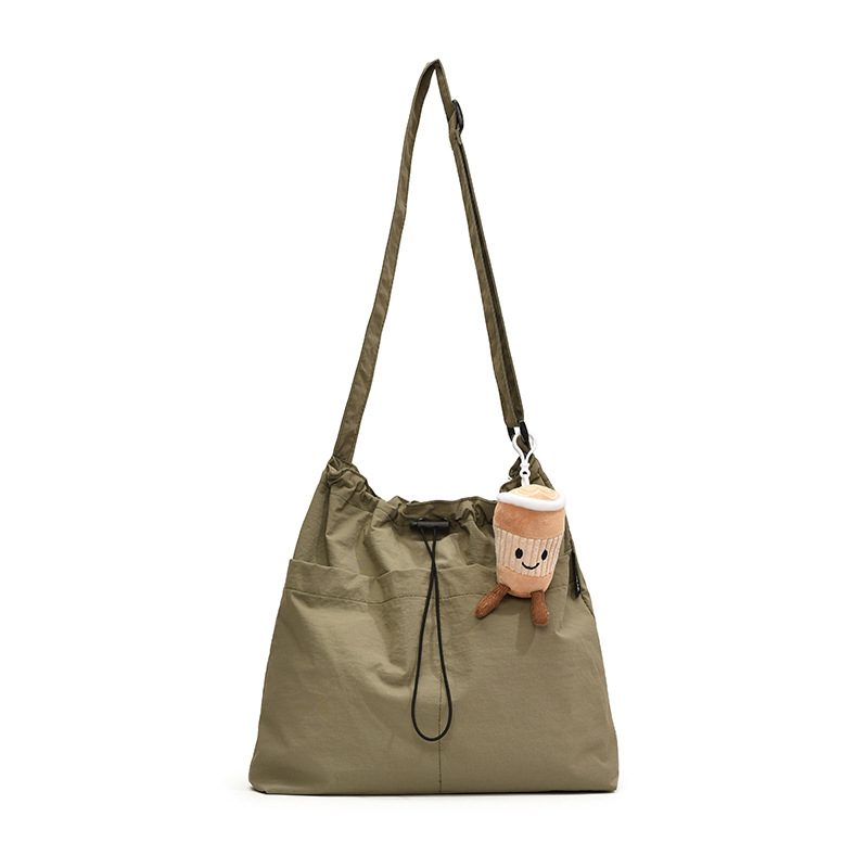 Bolsa de lona de moda simple 2024 nueva bolsa de mujer bolsa de hombro casual versátil de gran capacidad de viaje al trabajo bolso de cubo