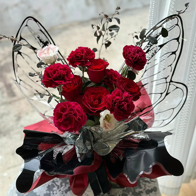 Nuevo día de San Valentín mariposa de cristal en forma de papel de embalaje impermeable material transparente red de alas de sangrana papel de envoltura de flores