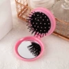 Folding mirror comb (pink 2)