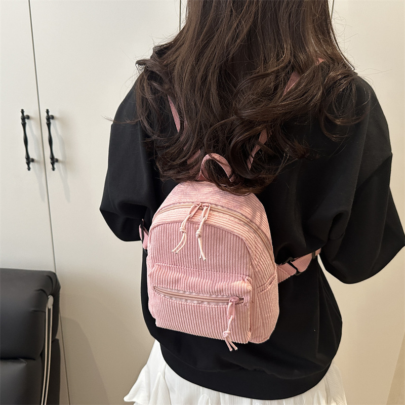2025 nueva mochila casual japonesa tendencia universal mochila de moda simple nicho bolso portátil ligero