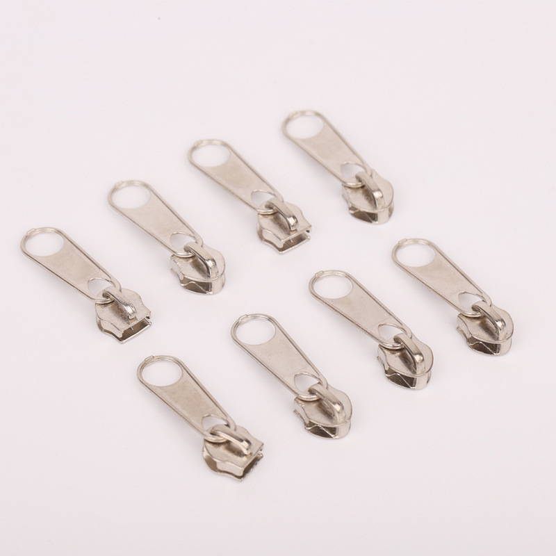 Manufacturer Sells 5 # Nylon Zipper Pulls in Stock, Black and White, for Dog Kennels, Bags, Tents, and Colorful Stationery Zipper Heads. Manufacturer Sells 5 # Nylon Zipper Pulls in Stock, Black and White, for Dog Kennels, Bags, Tents, and Colorful Stationery Zipper Heads.