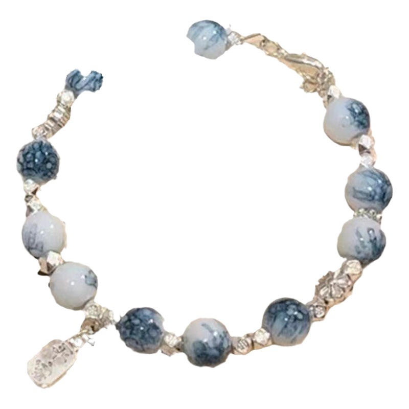 "Porcelana azul y blanca" Pequeño Libro Rojo popular pulsera de mariposa nicho femenino estilo antiguo puerta fría Super Hada pulsera segura de alto aspecto