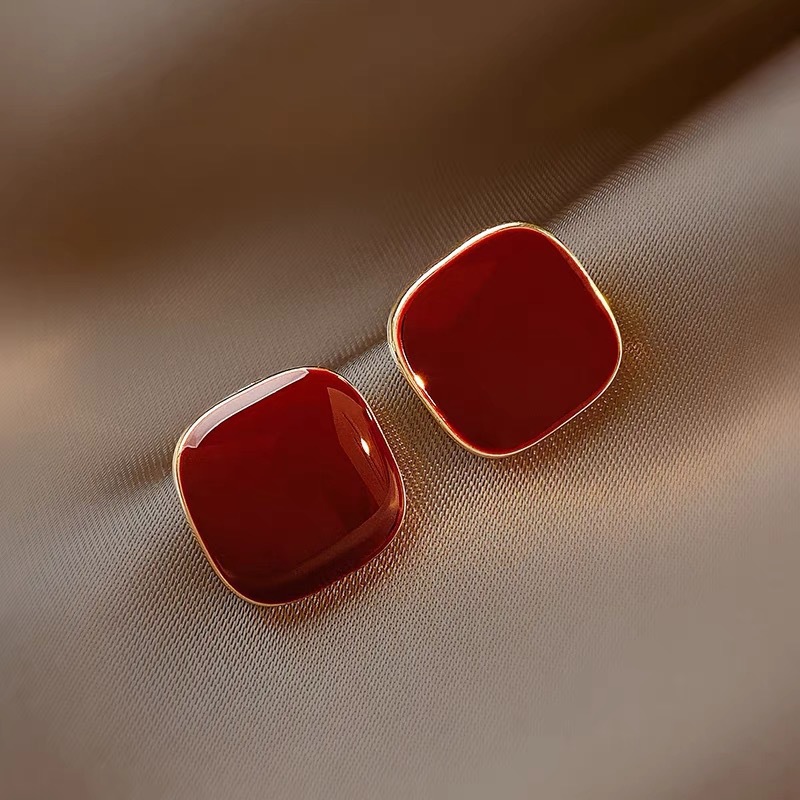 Aguja de plata de moda alta sensación de diamante de goteo de aceite pendientes nicho universal elegante pernos de orejas ligero lujoso temperamento simple orejas para mujeres