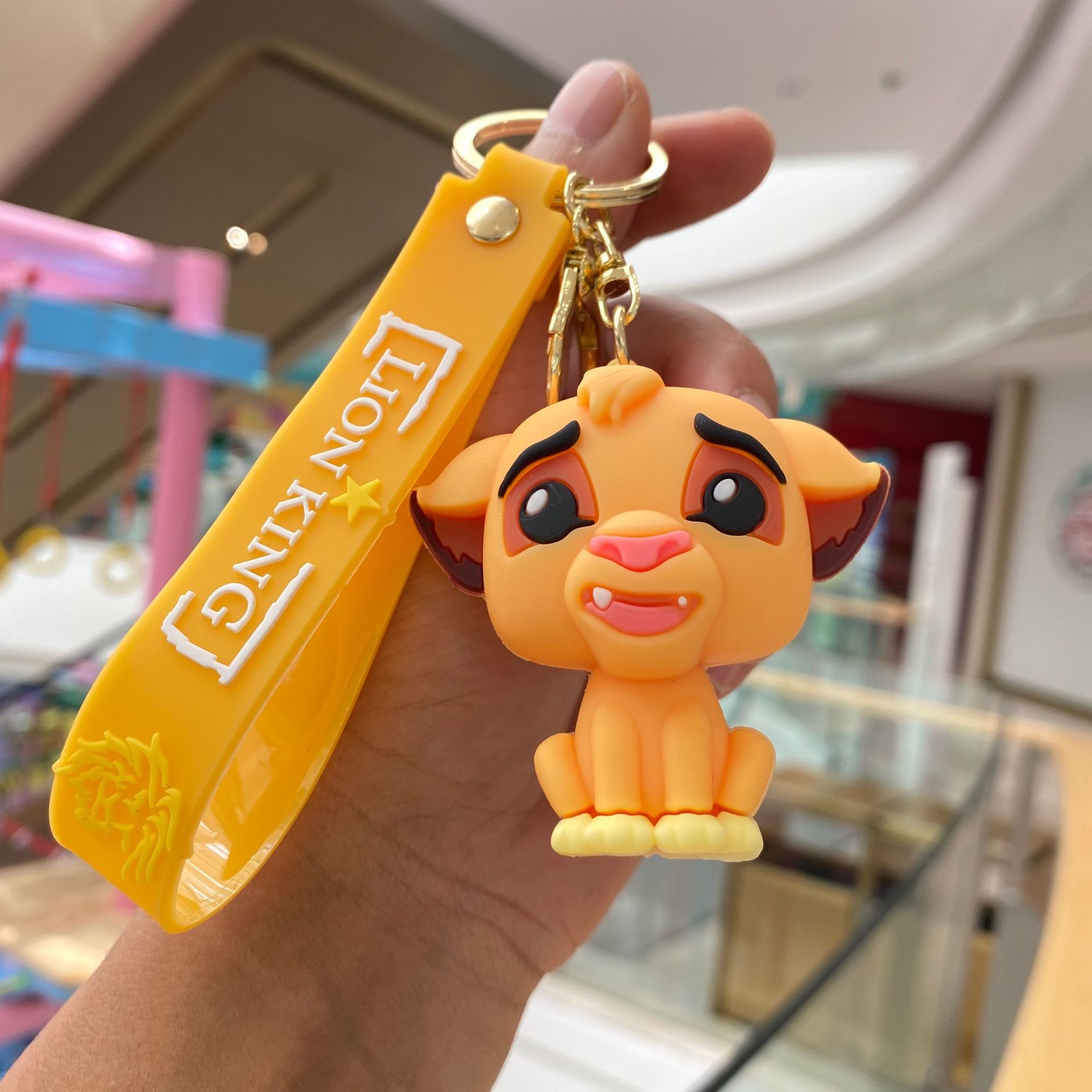 Creativo de dibujos animados lindo Simba Rey León llavero muñeca captura bebé máquina colgante bolsa accesorios pequeño regalo al por mayor